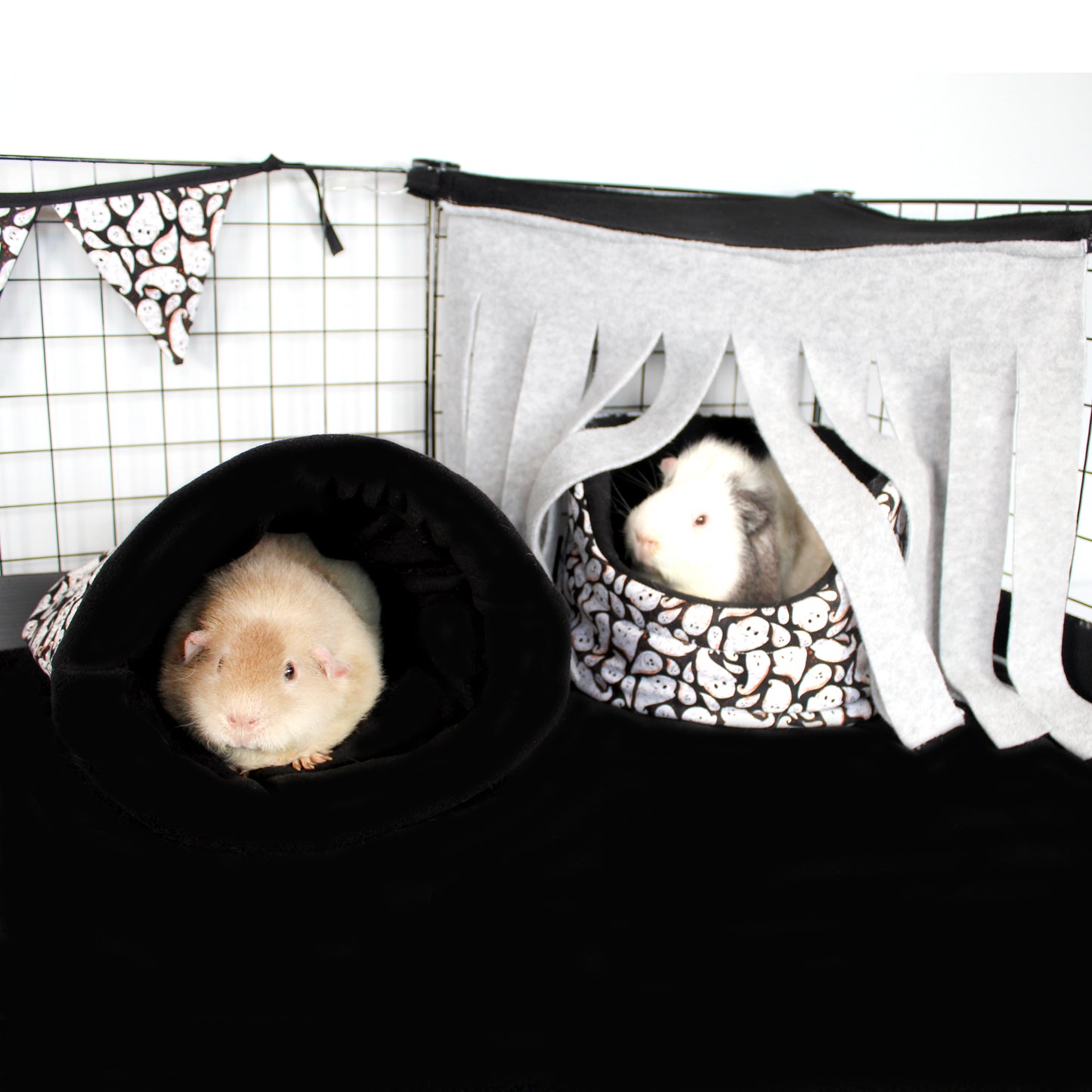 Halloween Ghost Cuddle Cup Bed And Cuddle Sack, in a cage set p showing how to use these guinea pig accessories to make a Halloween themed cage