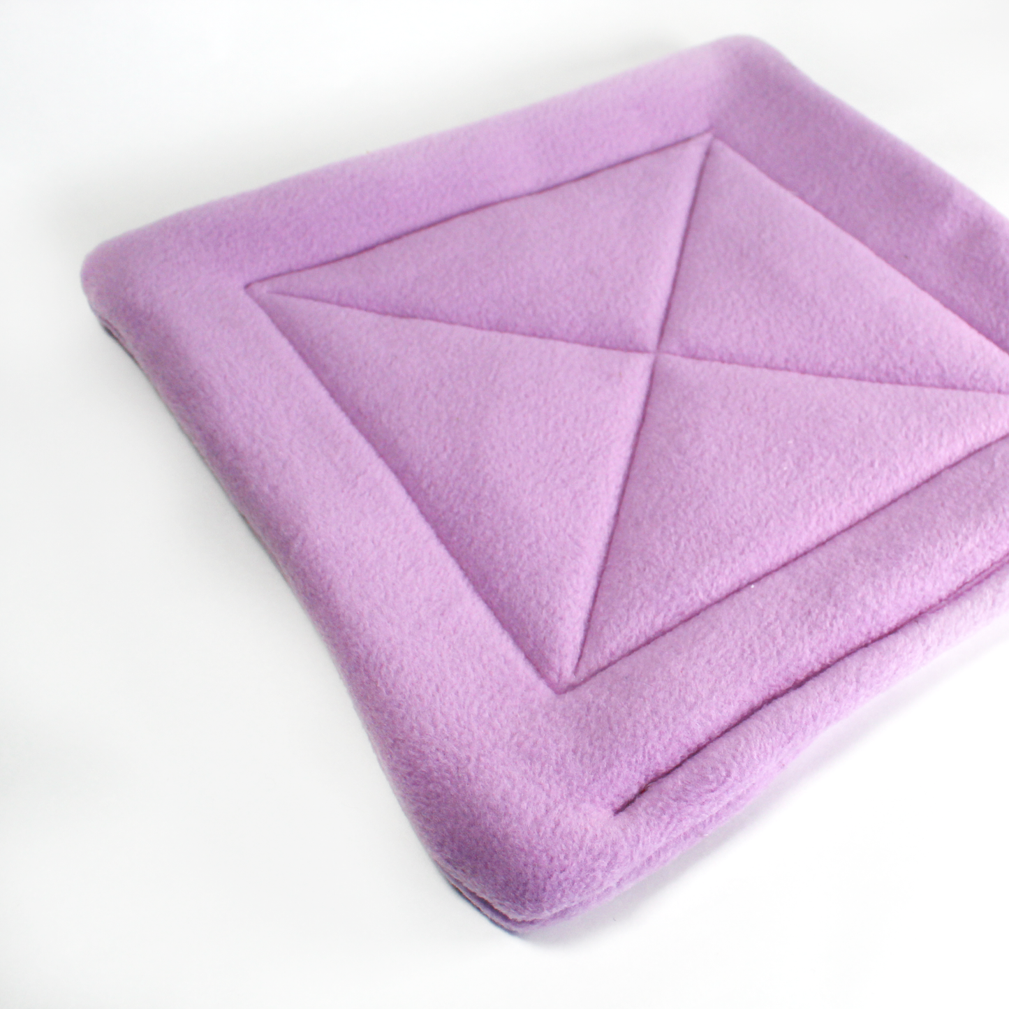 Large Lilac Square Pee Pad for Guinea Pigs, front view of the lap pad showing the detail without a guinea pig
