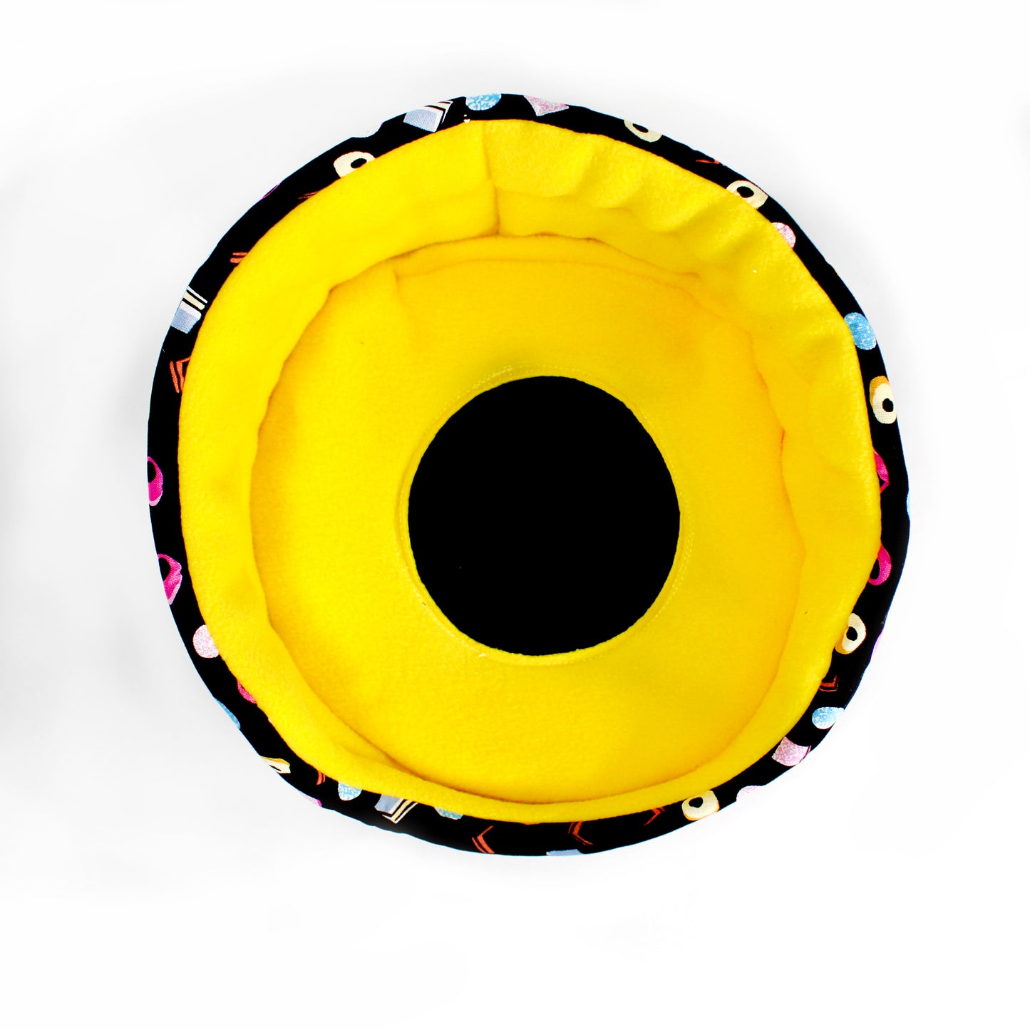 Pair Of Liquorice Allsorts Pee Pads, top view showing the pee pad fitting snugly inside a cuddle cup bed