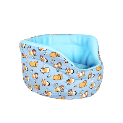 Light Blue Guinea Pig Pattern Bed, side view empty