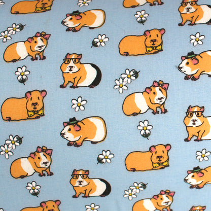 Light Blue Guinea Pig Pattern Snuggle Tunnel, close up of the guinea pig pattern cotton fabric