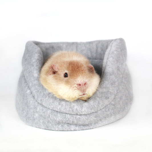 Gray Cuddle Cup Bed for Guinea Pigs with a happy guinea pig snuggled inside