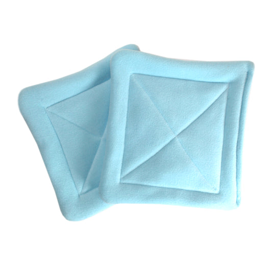 Pair Of Absorbent Baby Blue Fleece Pee Pads For Guinea Pigs, top view of the wee wee pads
