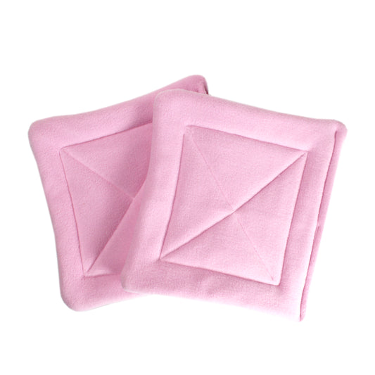 Pair Of Absorbent Baby Pink Fleece Pee Pads For Guinea Pigs, top view of the pair of guinea pig wee wee pads