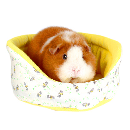 Yellow Bee Pattern Bed for Guinea Pigs, side view with guinea pig